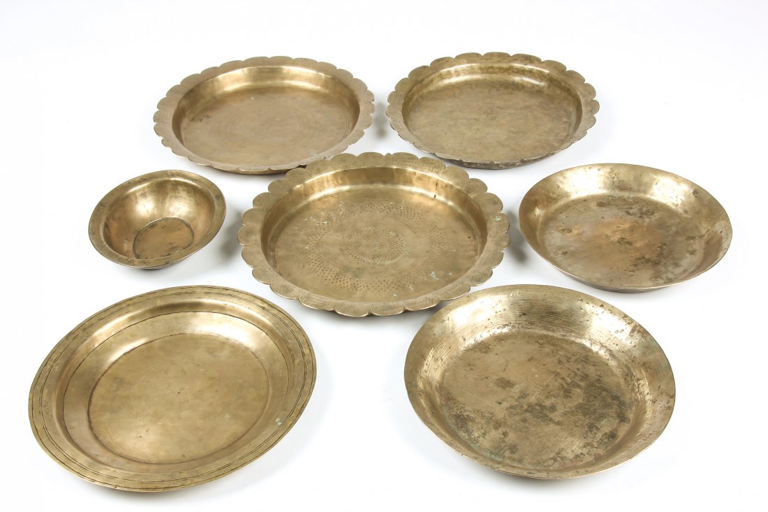 7 Heavy Bronze Plates/Bowls, Nepal: 7 Heavy Bronze Plates/Bowls, Nepal, very heavy, circa 1850-1950. Total weight: 5,763 g. Ranging in size from 1.5"H x 12.5"W x 12.5"D, 4 x 32 x 32cm to 1.75"H x 7.5"W x 6.25"D, 4 x 19 x 16cm. Provenanc