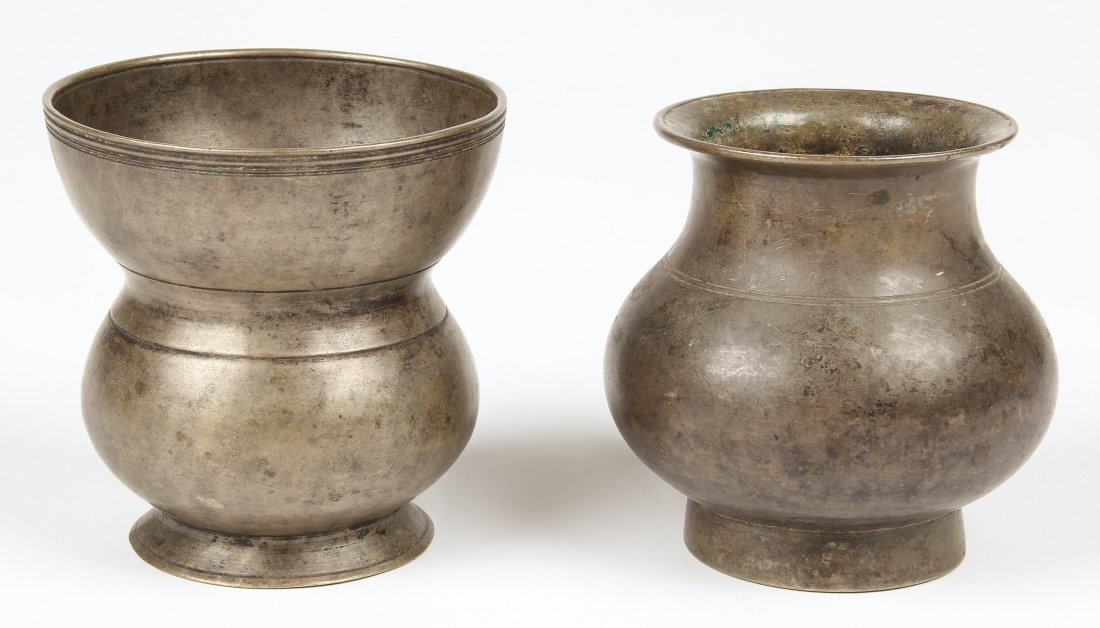 2 Bronze Vessels, Nepalese Early 19th c.: 2 Bronze Vessels, Nepalese Early 19th c., a heavy bronze oil pot and a begging bowl. Largest size: 4.25" x 4" x 4" (10.5 x 10 x 10 cm). Total weight: 1195 grams. Provenance: Matthew Friedman Collectio
