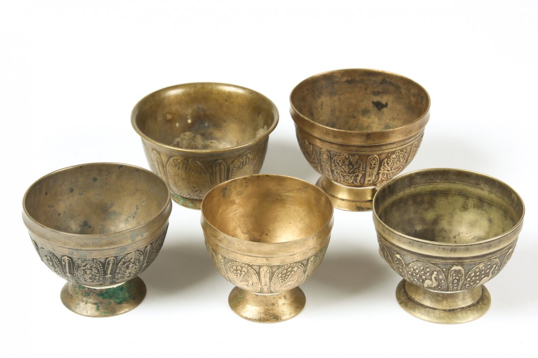 5 19th C Bronze Batuka Ceremonial Bowls: 5 19th C Bronze Batuka Ceremonial Bowls from Nepal, circa 1850-1900, ornate and heavy . Total weight: 1768 g. Largest: 3.25"H x 4.25"W x 4.25"D, 8 x 11 x 11cm. Provenance: Matthew Friedman Collection.