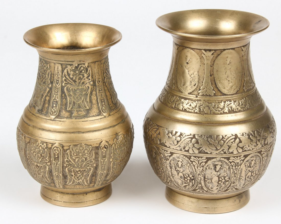2 Bronze Ceremonial Vases (Amkhora) Nepal, 19th C.: 2 Bronze Ceremonial Vases (Amkhora) Nepal, 19th C., ornately cast bronze vessels. Largest Size: 6" x 4" x 4" (15 x 10 x 10 cm). Total weight: 1210 grams. Provenance: Matthew Friedman Collection. Matth