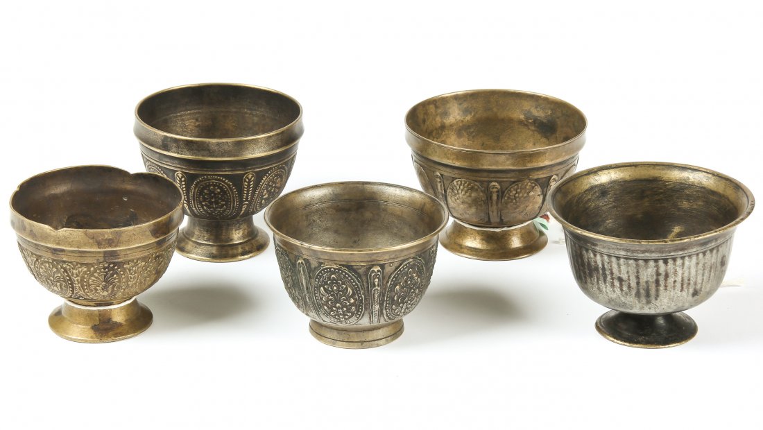 5 19th C Bronze Batuka Ceremonial Bowls: 5 19th C Bronze Batuka Ceremonial Bowls from Nepal, circa 1850-1900, ornate and heavy. Total weight: 1504 g. Largest: 3.25"H x 4"W x 4"D. 8 x 10 x 10cm. Provenance: Matthew Friedman Collection. Matthe