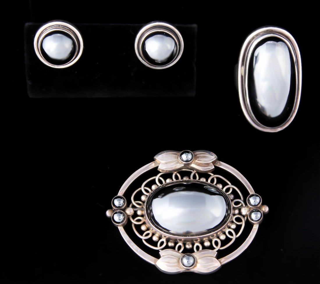 Harald Nielsen for Georg Jensen Hematite Suite: Harald Nielsen for Georg Jensen Hematite Suite. Ring, brooch and post earrings. Largest size: 1.5"L x 1.75"W 4 x 5 cm; Ring size: 5.