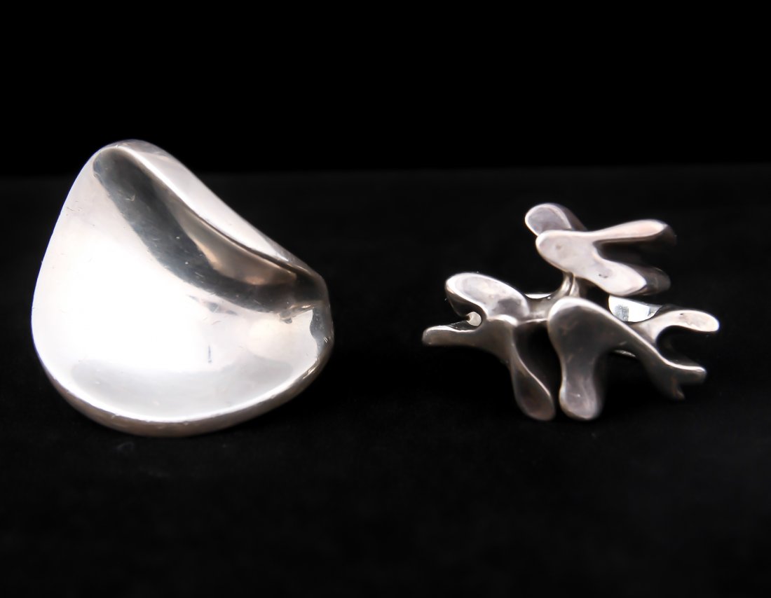 2 Georg Jensen Modernist Sterling Silver Rings, Hans: 2 Georg Jensen Modernist Sterling Silver Rings. Hans Hansen and Andreas Mikkelsen for Jensen. Ring size: 5.5. Total weight: 1.06 ozt.