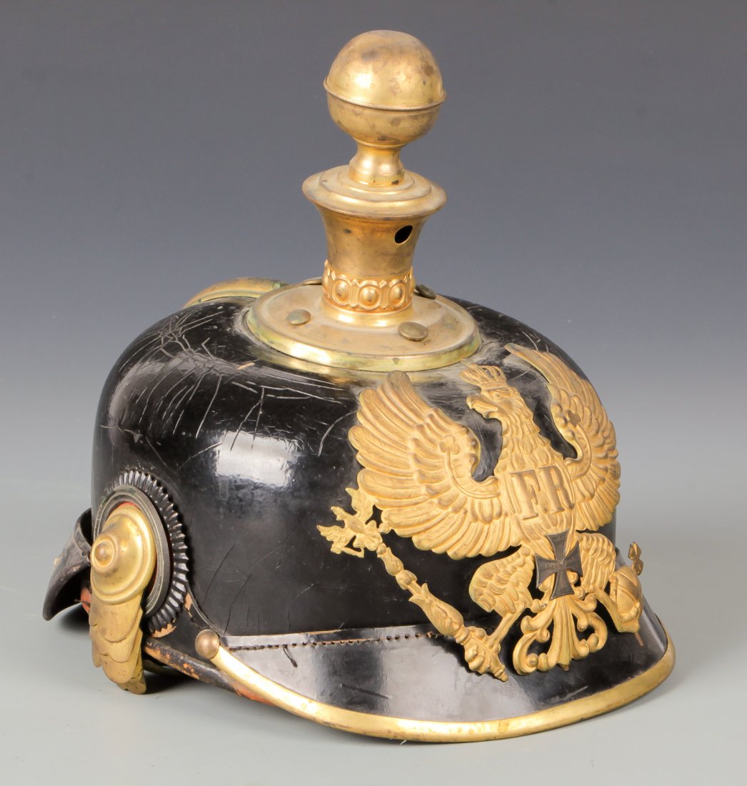 Imperial Prussian WWI Artillery Officer Pickelhaube: Imperial Prussian WWI Artillery Officer Pickelhaube. Round spike finial. Size: 8.25''H x 7.5''W x 8.75''D, 21 x 19 x 22 cm.