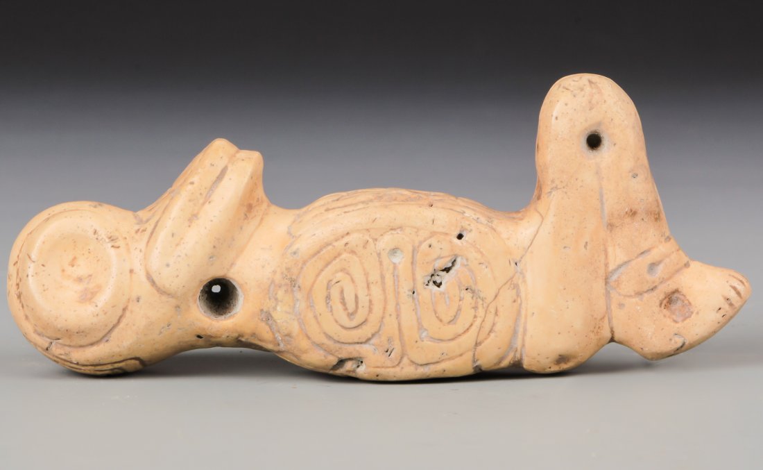 Taino Large Stone Bird-Man Pendant (1000-1500 CE): Taino Large Stone Bird-Man Pendant (1000-1500 CE) Secondary faces in wing designs. Birds were shaman allies who guided their visionary souls through the cosmic realm. Nice soft polish from ware. Size: