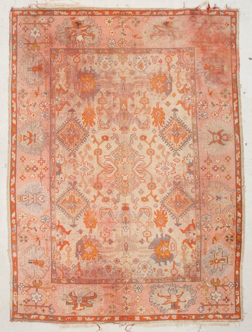 Antique Oushak Rug: 8'5" x 11'3" (257 x 342 cm): Antique Oushak Rug: 8'5" x 11'3" (257 x 342 cm), Turkey, circa 1900. Original estate condition, shows wear, fraying. Note: this lot is being re-offered due to a non-paying bidder.