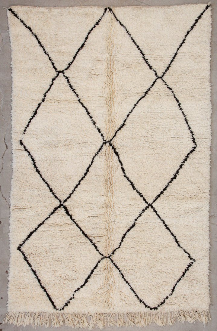 Vintage Beni Ourain Rug: 5'9" x 8'9" (176 x 267 cm): Vintage Beni Ourain Rug, Morocco: 5'9" x 8'9" (176 x 267 cm). Hand-knotted with undyed natural shades of hand-spun sheep's wool; thick, shaggy, lustrous pile. Recently professionally cleaned. Prov: pr