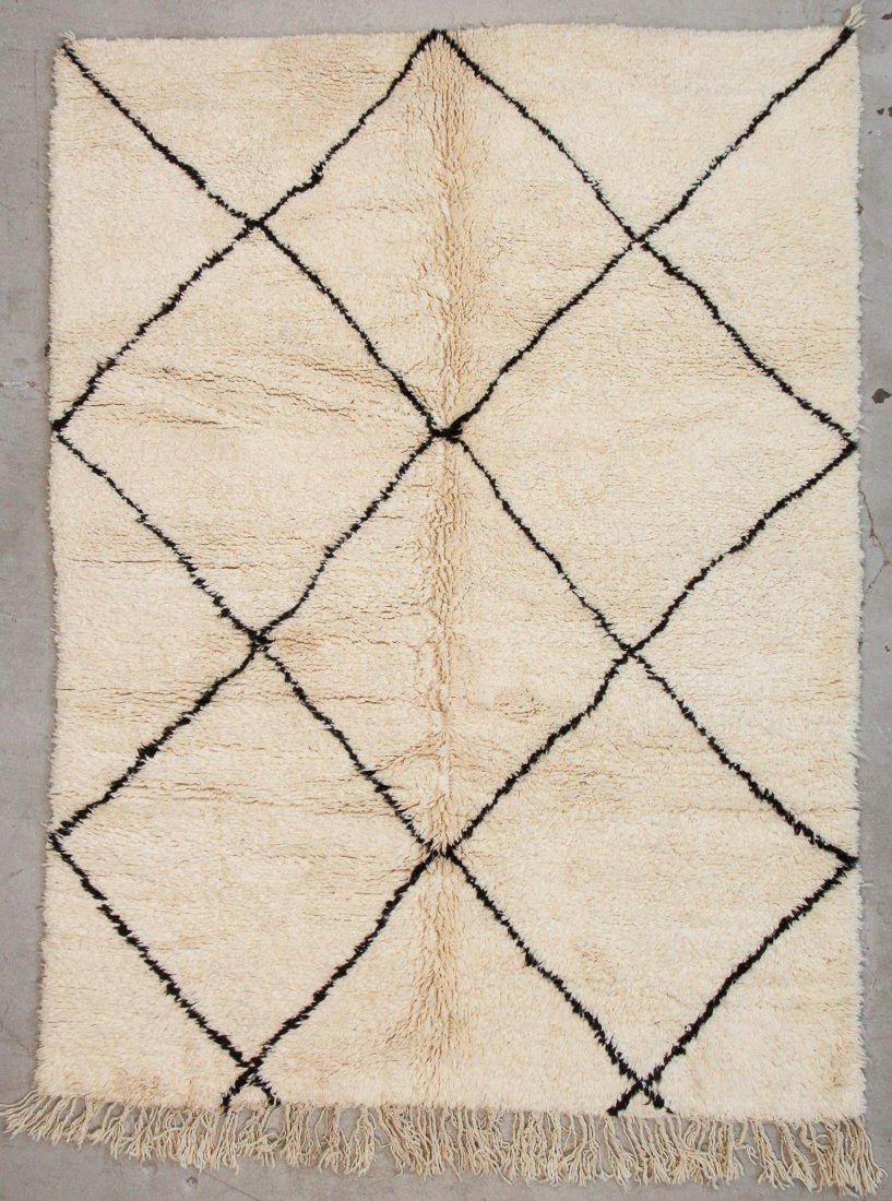 Vintage Beni Ourain Rug: 6'2" x 8'2" (187 x 250 cm): Vintage Beni Ourain Rug, Morocco: 6'2" x 8'2" (187 x 250 cm). Hand-knotted with undyed natural shades of hand-spun sheep's wool; thick, shaggy, lustrous pile. Recently professionally cleaned. Prov: pr