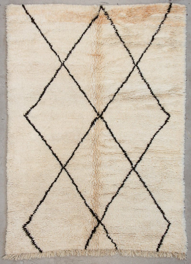 Vintage Beni Ourain Rug: 5'10" x 8'2" (177 x 250 cm): Vintage Beni Ourain Rug, Morocco: 5'10" x 8'2" (177 x 250 cm). Hand-knotted with undyed natural shades of hand-spun sheep's wool; thick, shaggy, lustrous pile. Recently professionally cleaned. Prov: p