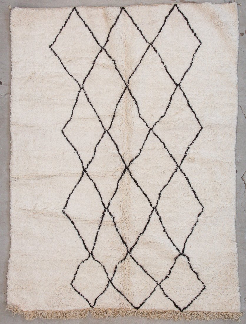 Vintage Beni Ourain Rug: 5'9" x 7'8" (175 x 234 cm): Vintage Beni Ourain Rug, Morocco: 5'9" x 7'8" (175 x 234 cm). Hand-knotted with undyed natural shades of hand-spun sheep's wool; thick, shaggy, lustrous pile. Recently professionally cleaned. Prov: pr