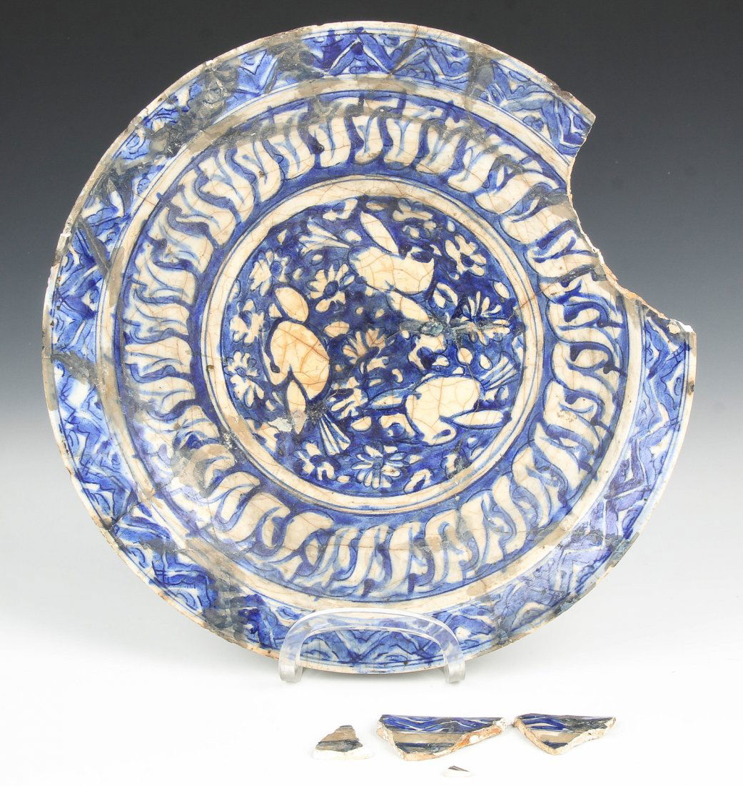 Antique Islamic Blue and White Bowl: Antique Islamic Blue and White Bowl. Old breakage. Size: 13.75'' x 13.75'' x 2.75'' (35 x 35 x 7 cm). Estate of Edward Soleimani, Englewood, NJ.