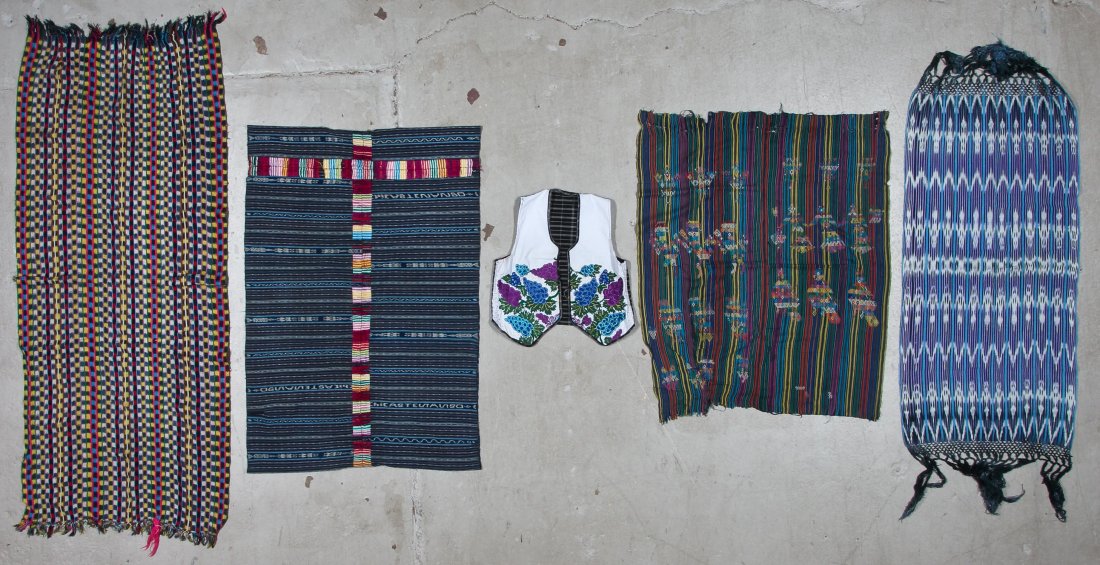 5 Fine Vintage Guatemalan Ikat Textiles: 5 Fine Vintage Guatemalan Ikat Textiles. 1977. Consisting of a indigo dyed corte from Chicastenango, 2 ikat shawls, 1 brocade tzute, and 1 machine embroidered vest. Largest Size: 29'' x 72'' (74 x 183