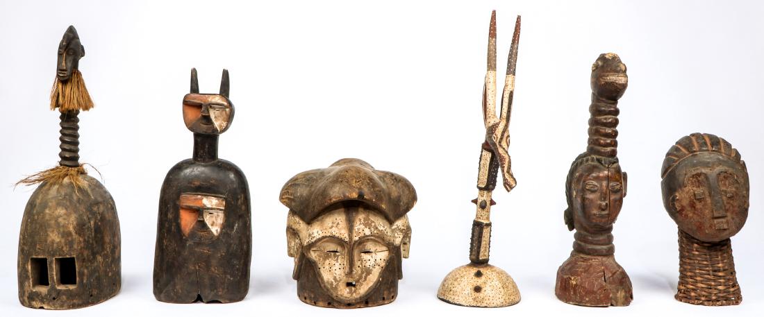 6 African Tribal Headdresses: 6 African Tribal Headdresses. Including Gurunsi, Senufo, Yoruba, Fang and Toma. Largest Size: 26.75'' x 7.5'' x 11'' (68 x 19 x 28 cm). Provenance: ex New York private ethnographic arts collection. No