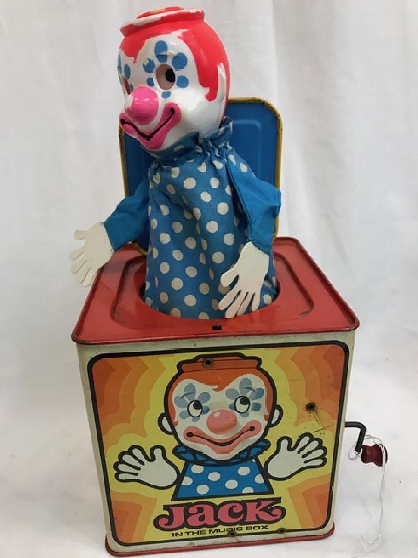 Vintage Mattel Clown Jack in the Box: VIntage Mattel brand clown jack in the box. Box is made of metal. Clown's eyes have movement. Measures approx. 5.5" H x 5.5" W x 5.5" D.