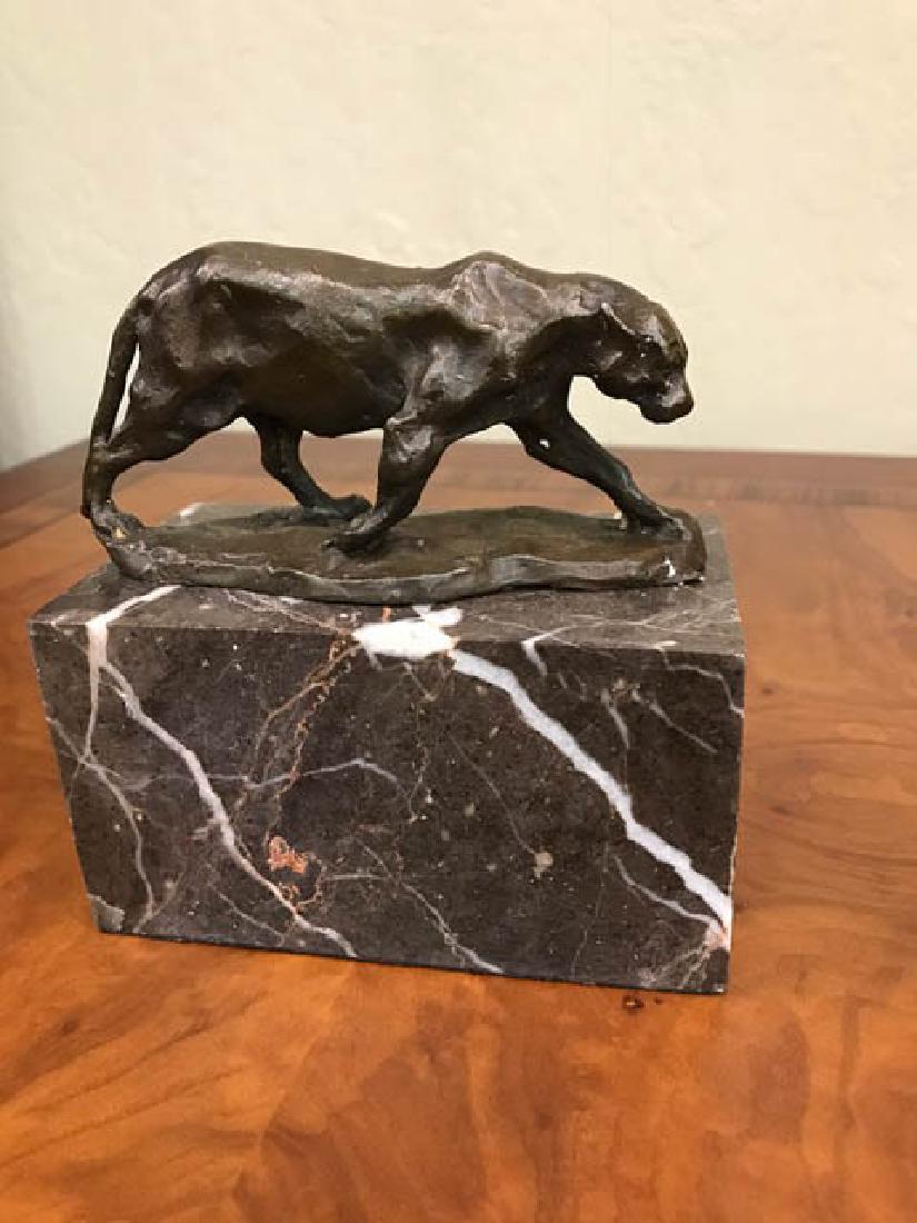 Miniature Bronze Statue of Mountain Lion, Signed: Miniature bronze statue of a mountain lion. Mounted on terracotta colored marble base. In excellent condition. Signed. From a private collection. Measures approx. 5" H x 5" W x 3" D