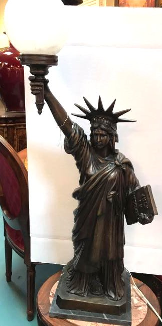 Bronze Statue of Liberty Statue with Light: Bronze Statue of Liberty statue with light mounted on a solid marble base. Has excellent details and light can be used for indoor or outdoor use. In good condition. Measures approx. 37.5"H x 14"W x 9.