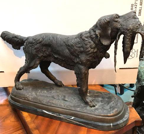 Bronze Statue of Dog Carrying Prey by P.Mene: Bronze statue of a hunting dog carrying prey signed "Pirre-Jules Mene. Has great details and is mounted on a black marble base. Measures approx. 18"H x 31"W x 10"D.