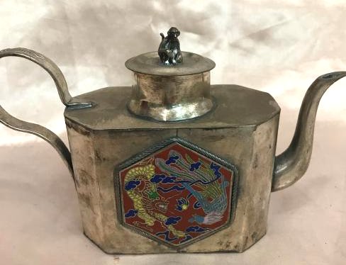Antique Miniature Silver Tea Pot w/ Dragon Scene: Antique miniature silver tea pot with a monkey on top and a cloisonne plaque on each side with a dragon and a sphynx. Marked on the bottom. Measures approx. 4"H x 6.5"W x 2"D.