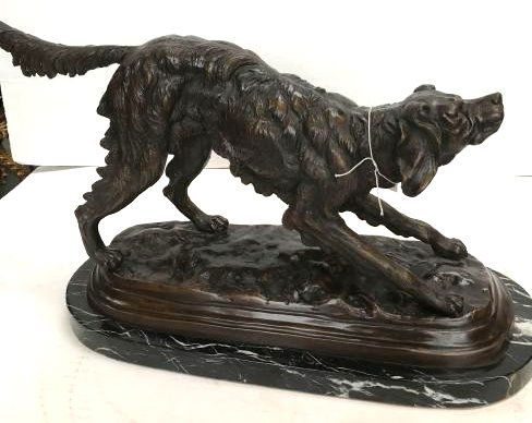 Bronze Fountain/Statue of a Dog Stretching, Marble Base: Unique bronze fountain/statue of a dog stretching with exceptional details. Mounted on a black marble base. In excellent condition. Measures approx. 12"H x 22"W x 7.5"D.