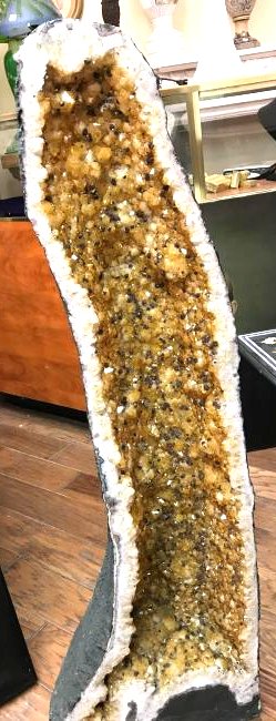Beautiful Tall Citrine Crystal Cathedral Geode: Beautiful citrine crystal cathedral geode rich in citrine orange color with brown throughout. In good condition, from a private collection. Weight is 56 kilo and measures approx. 44"H x 14"W x 8"D.