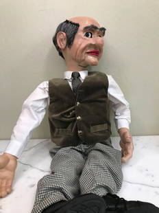 Vintage Ventriloquist Dummy w/ Realistic Features: Vintage ventriloquist dummy puppet doll with realistic features including real hair, moving eyes and mouth. Mechanism is in back and is in good, working condition. Dummy has a small crack on top of he