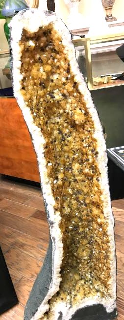 Beautiful Tall Citrine Crystal Cathedral Geode: Beautiful citrine crystal cathedral geode rich in citrine orange color with brown throughout. In good condition, from a private collection. Weight is 56 kilo and measures approx. 44"H x 14"W x 8"D.