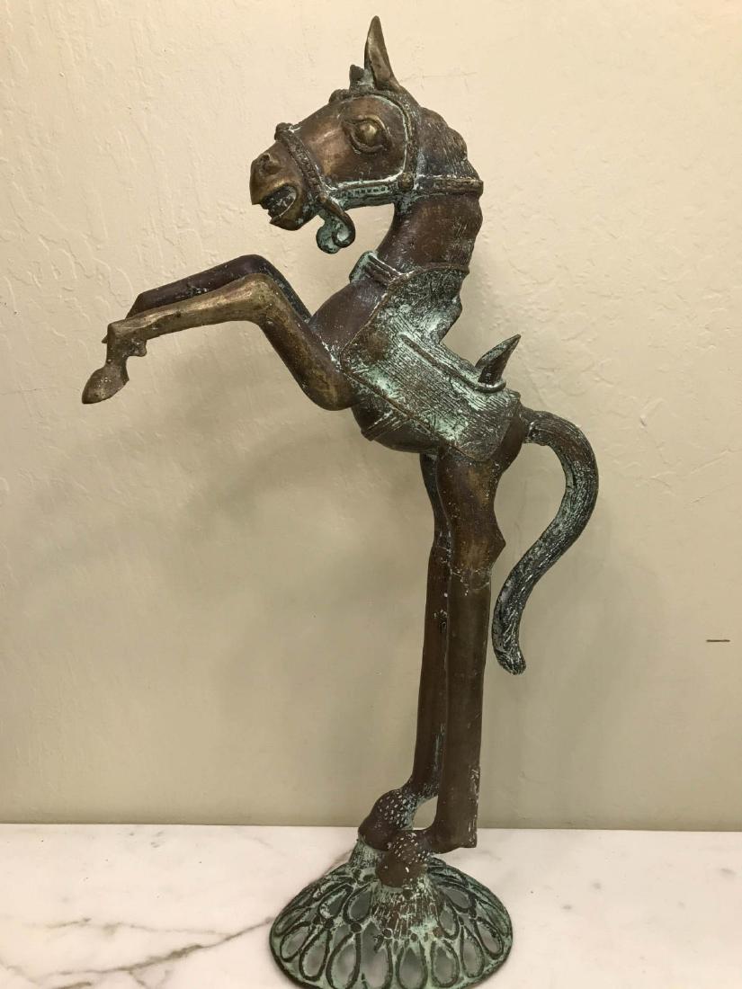 Vintage Abstract Bronze Horse Statue: Vintage abstract bronze horse statue with antiqued patina. Measures approx. 24"h x 13"W x 5"D.