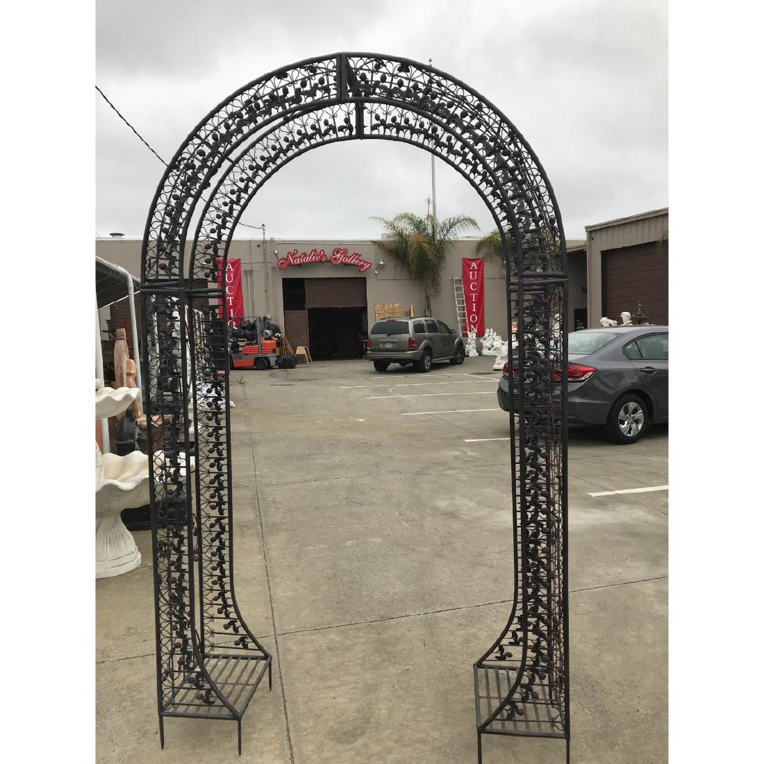 Wrought Iron Garden Arbor/Arch with Red Flowers