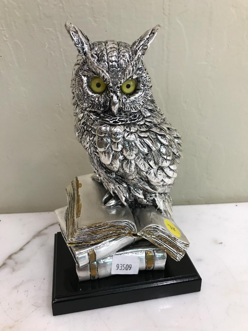 Silver Italian Owl Statue Standing on Books: Silver over metal Italian statue of an owl standing on books. In good condition. Measures approx. 9"H x 5"W x 3.5"D.