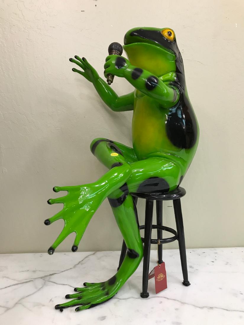 Bronze Statue of Frog on Stool w/ Microphone: Unique patinated bronze statue of a frog sitting on a stool playing a guitar. In good condition, from a private collection. Measures approx. 30"H x 20"W x 22"D.