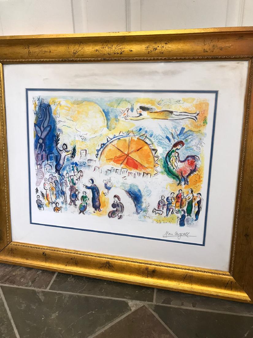 "Four Seasons" Marc Chagall Lmd. Ed. Print: A limited edition print by Marc Chagall titled "Four Seasons" numbered 6/99. Framed in a gilded wooden frame measuring approx. 27.5"H x 31.5"W.