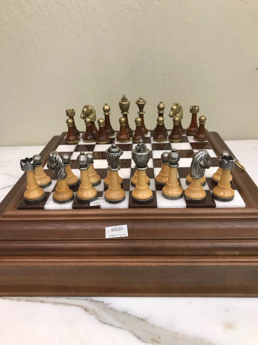 Italian Chess Set w/ Marble Board: Italian-made chess set with white and terracotta colored marble board and wood and metal game pieces. Comes with wood box for storage. A quality set in good condition. From a local estate. Box measure