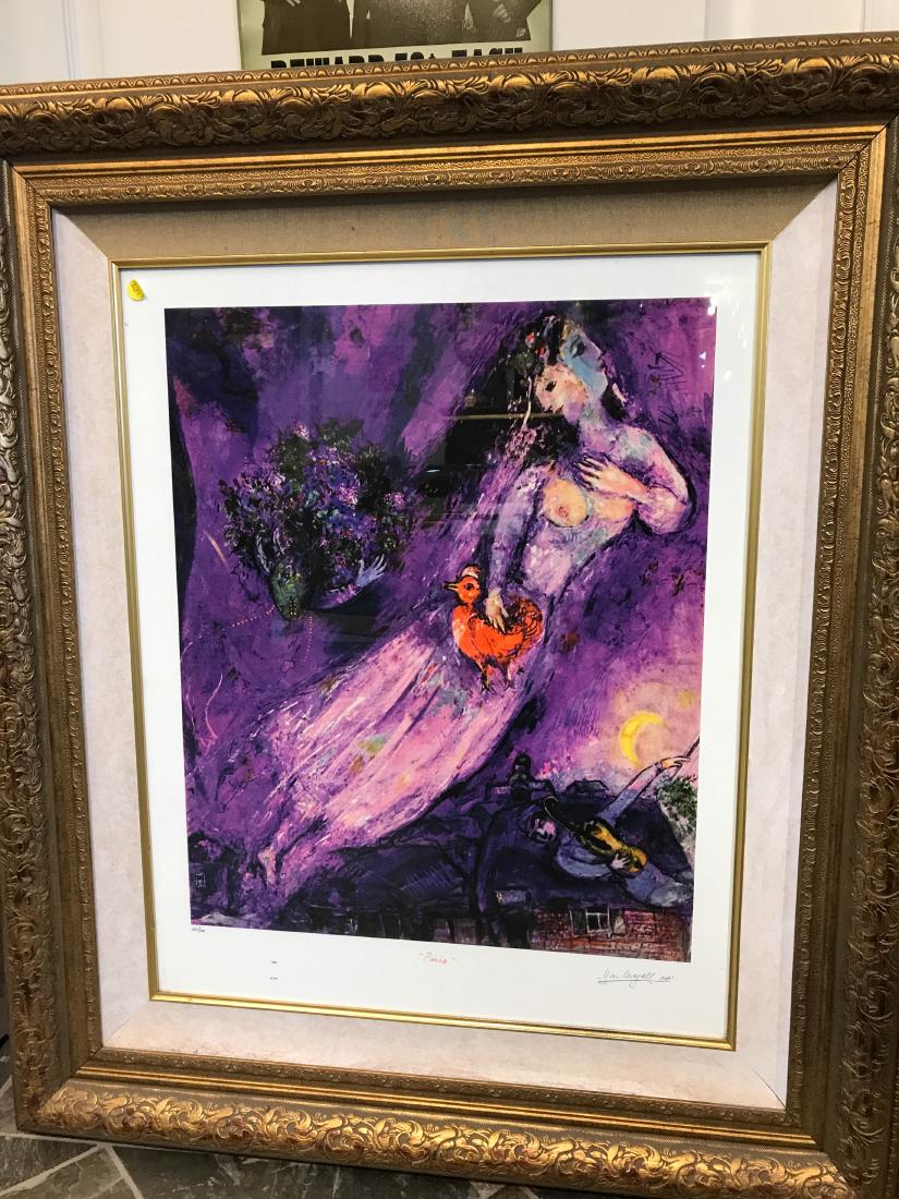 Abstract Woman Lmd. Ed. Marc Chagall Print: A limited edition Marc Chagall print, numbered 280/500 of an abstract scene with a woman. From a local estate. Framed in a detailed, gilded wooden frame measuring approx. 42"H x 36"W.