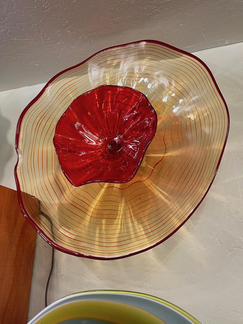 Handblown Glass Wall Art - Red, Orange: Handblown glass wall art, two-layered, orange and red colors. Comes with wall mount. In excellent condition. Measures approx. 20"H x 20"W x 6"D with mount.