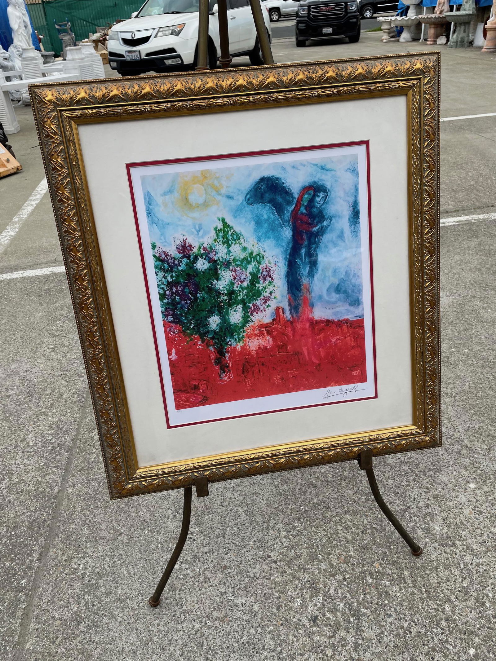 Limited Edition Marc Chagall Print - 8 of 99: Limited Edition Marc Chagall Print - 8 of 99Title: Lovers Above VillageGilded Wood Frame Private Collector Good Condition Dimensions: 29" x 26"