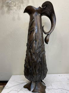 Large Bronze Pitcher with Willow Leaves: Unusual large bronze pitcher with willow leaves throughout. In good condition with good detail. From a local, private estate. Measures approx. 30.5"H x 12"W x 9"D.