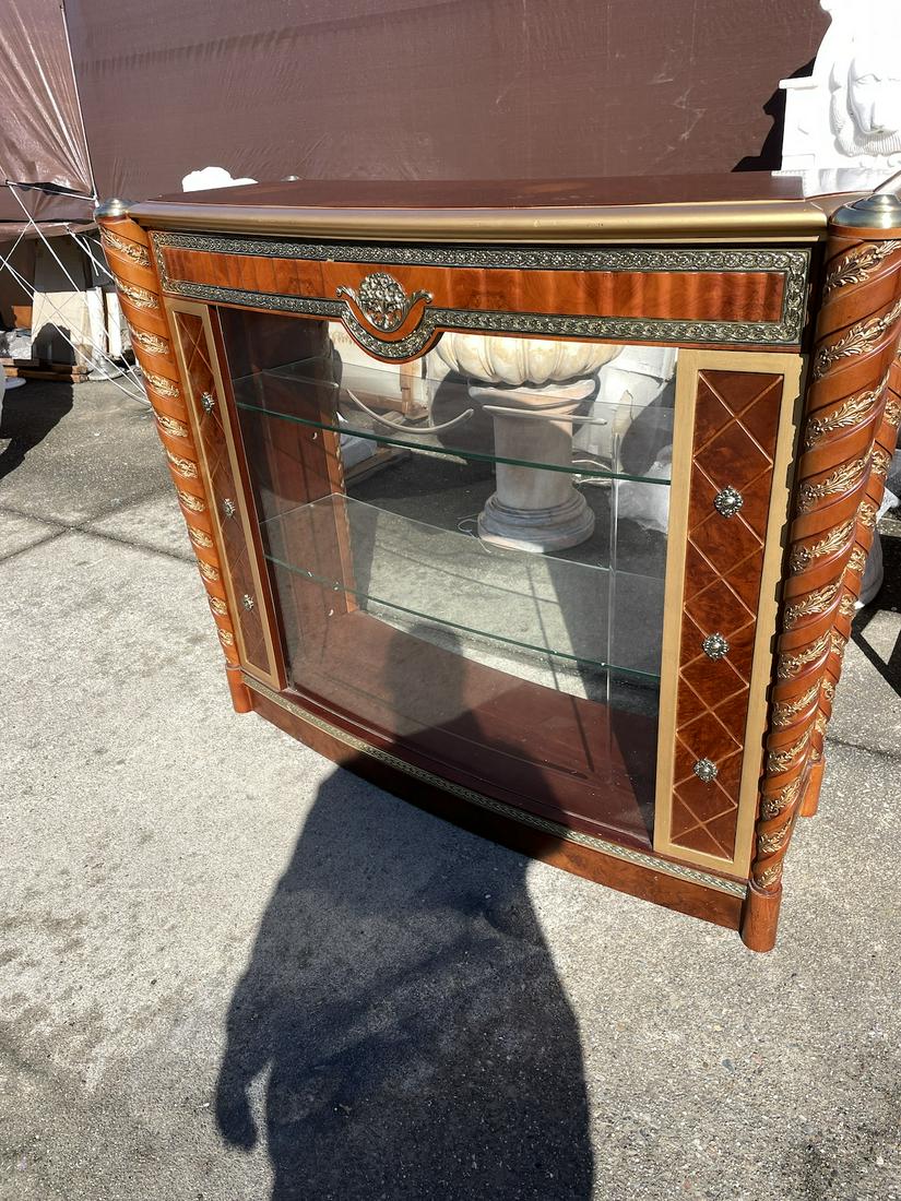 Wood and Glass Bar: A beautiful bar with a unique shape. In excellent condition and never been used. Approximate measurement: 43 1/2" x 64" x 18 1/2"