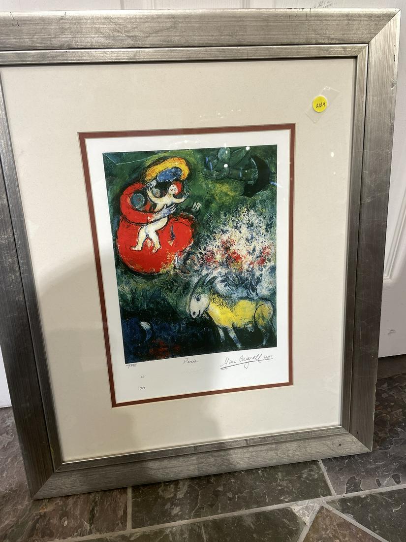 "Madonna and the Red Robe" Marc Chagall Print: A limited edition of "Madonna and the Red Robe" by Marc Chagall. Numbered 10/375. Pencil signed. In good condition. Framed in a silvered wood frame measuring approx. 26"H x 21.5"W.