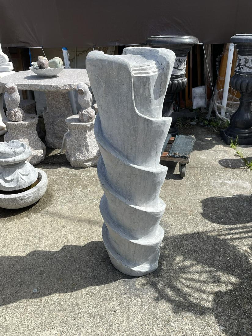 Unique Granite Spiral Fountain: Unique spiral shaped fountain made of granite. In good, unused condition. Measures approx. 39.5"H x 12" diameter.