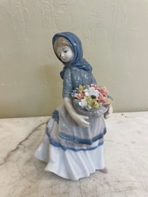 Porcelain Girl Holding Bouquet of Flowers
