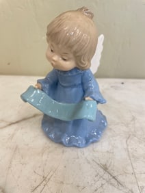 Small Porcelain Cherub Figurine
