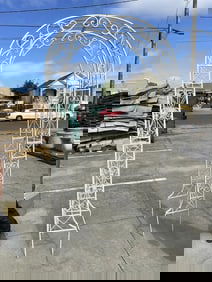 White Garden Arch with Scroll Design