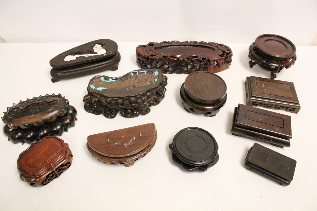 Lot of solid wood stands, most hand carved (1 of 10)