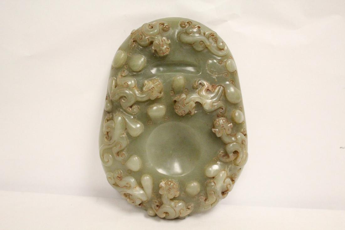 A Chinese celadon jade carved ink slab (1 of 10)