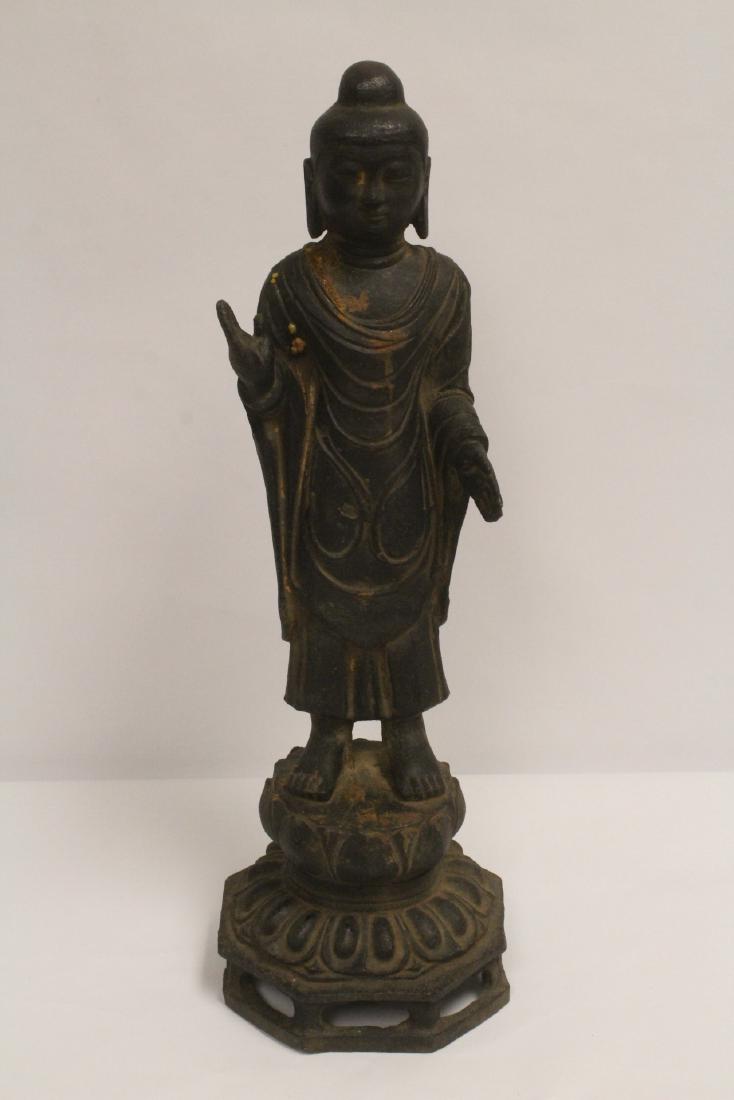 A large cast iron sculpture of standing Buddha (1 of 10)