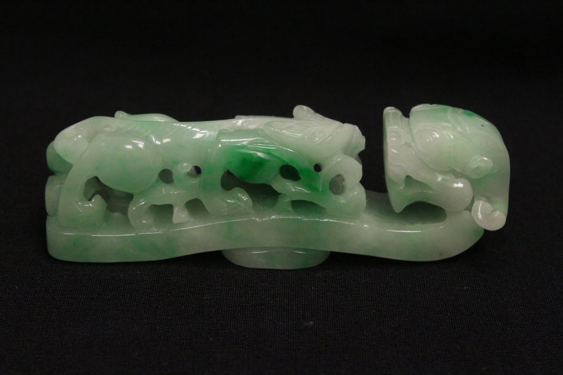 A fine apple green jadeite carved dragon belt buckle (1 of 10)