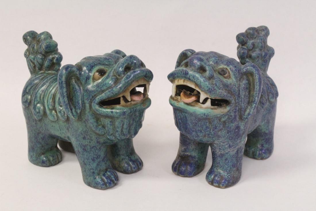 Pair Chinese antique blue glazed fulion, c1850: Pair Chinese antique blue glazed fulion, c1850, 3.6"Hx4.2"x2.5"