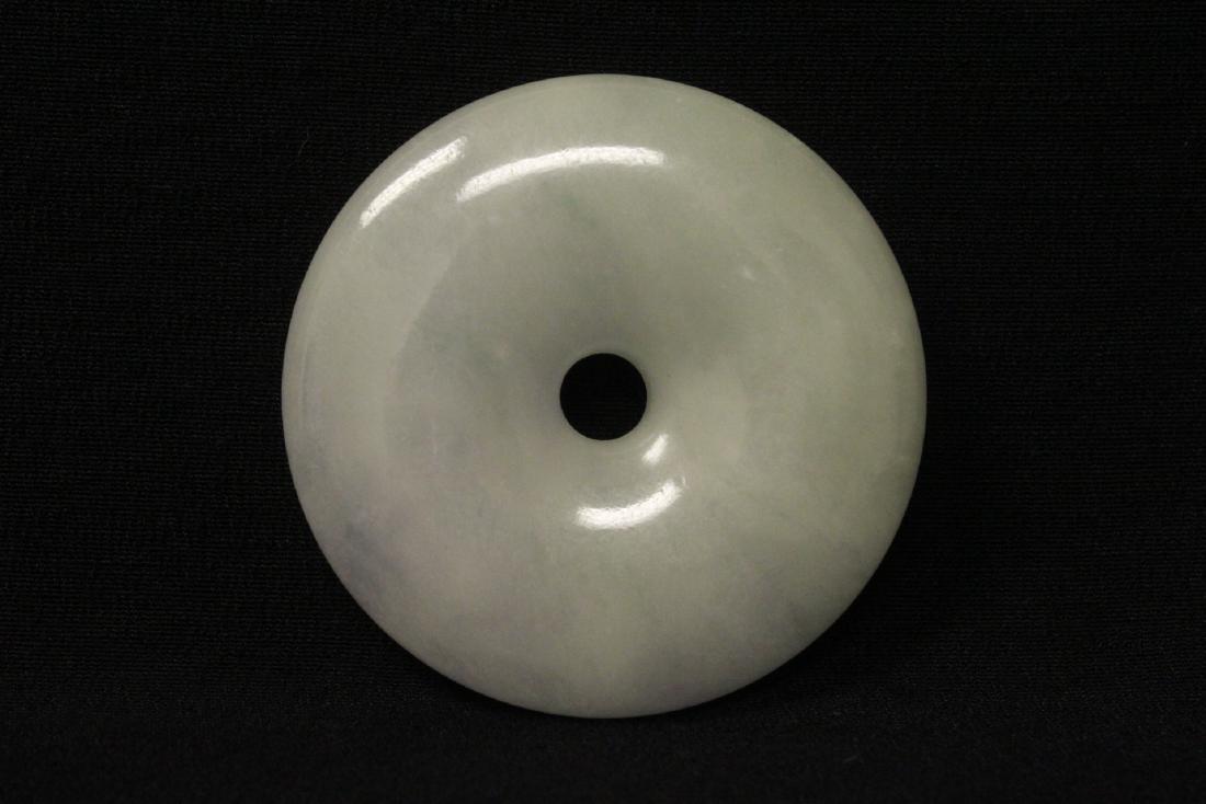 A fine Chinese jadeite carved disc (1 of 10)