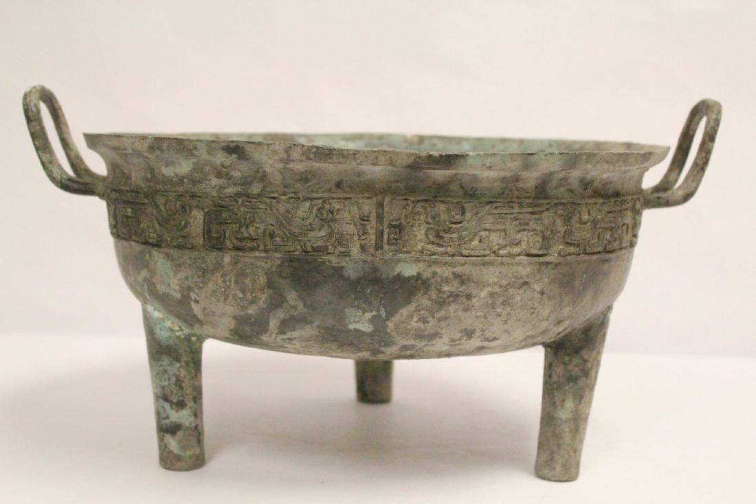 A large Chinese archaic style bronze tripod ding (1 of 10)