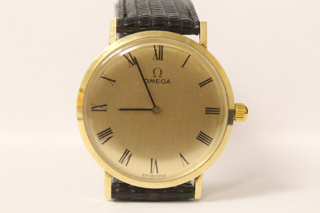 man's 14K Y/G Omega wrist watch (1 of 9)